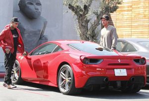 Aura on X: hey if u wanna see the ugliest car wrap in existence, here's a  Ferrari F12 for sale in Dubai right now the Supreme x Louis Vuitton wrap  was designed